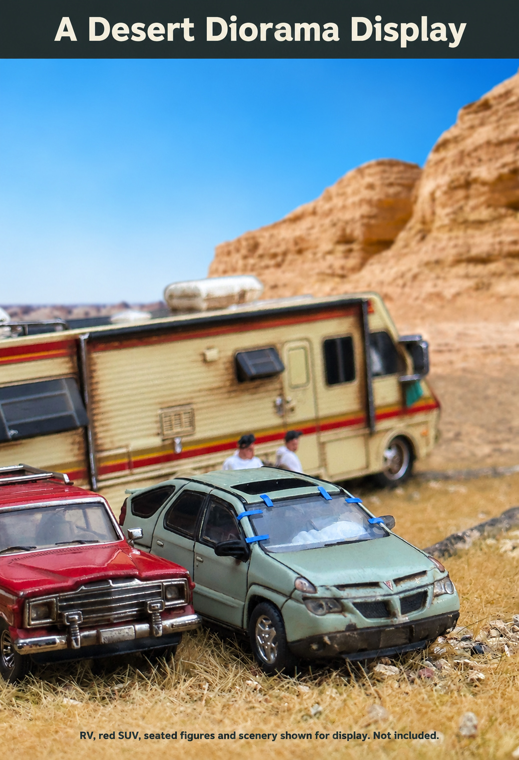 Weathered Aztek in a desert display group; RV, other vehicles and scenery are display props