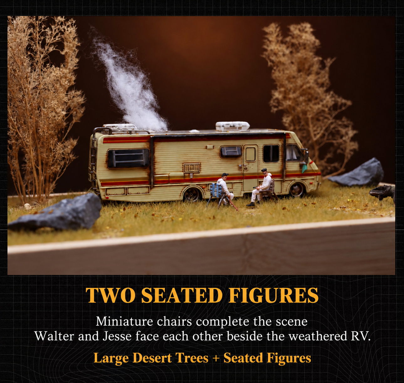 Two seated figures in miniature chairs facing one another beside the RV in the large desert-tree scene